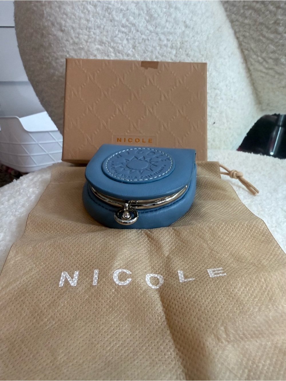 Nicole Powder Blue Leather Mini Coin Case with Embossed Medallion